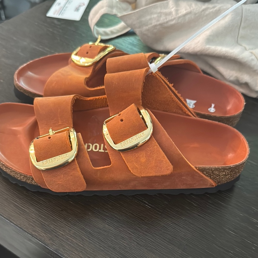 Birkenstock Burnt Orange Sandals with Gold Buckles